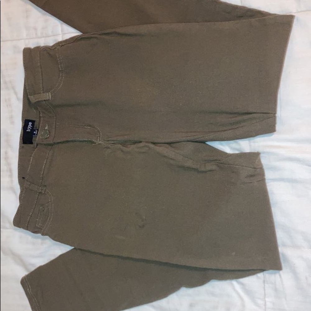 I am selling a brown pair of slim jeans